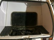 Багажник мобильной кофейни на базе VW T3, борт, потолок и перегородка обшиты композитными панелями фото